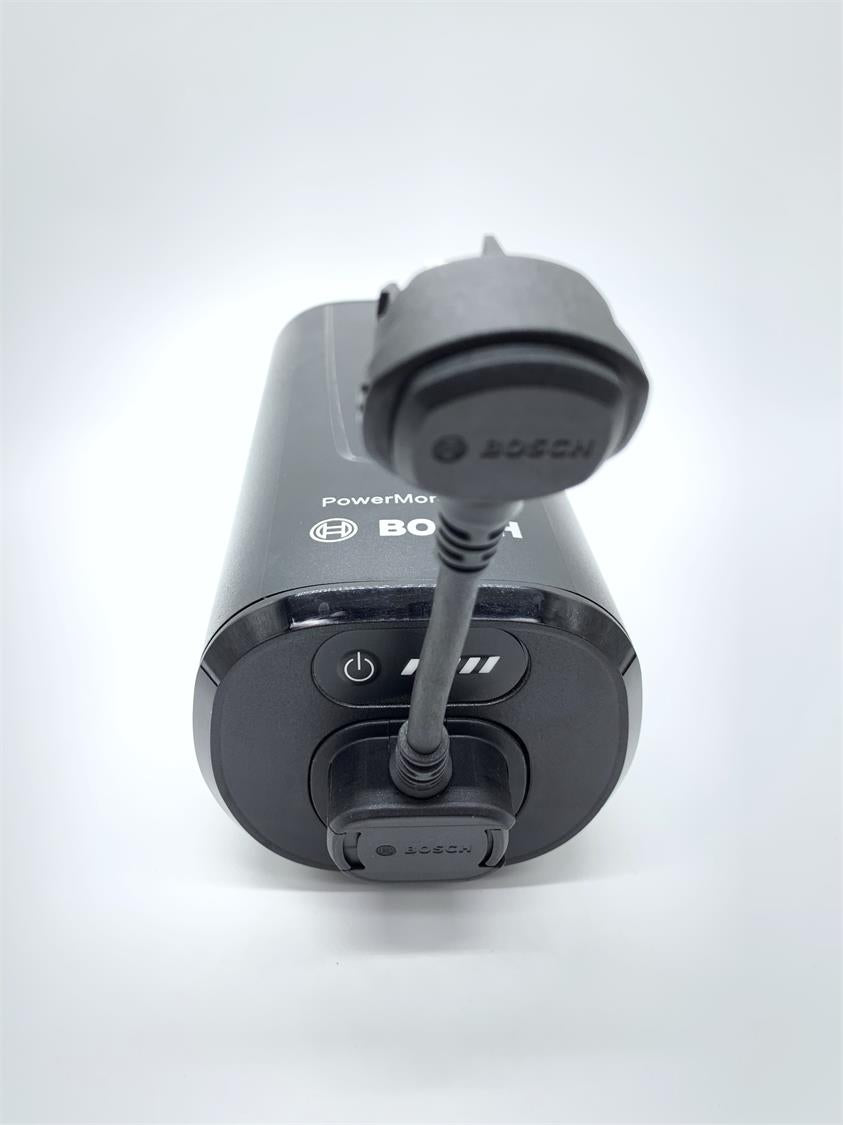 Cable routing away from the battery holder