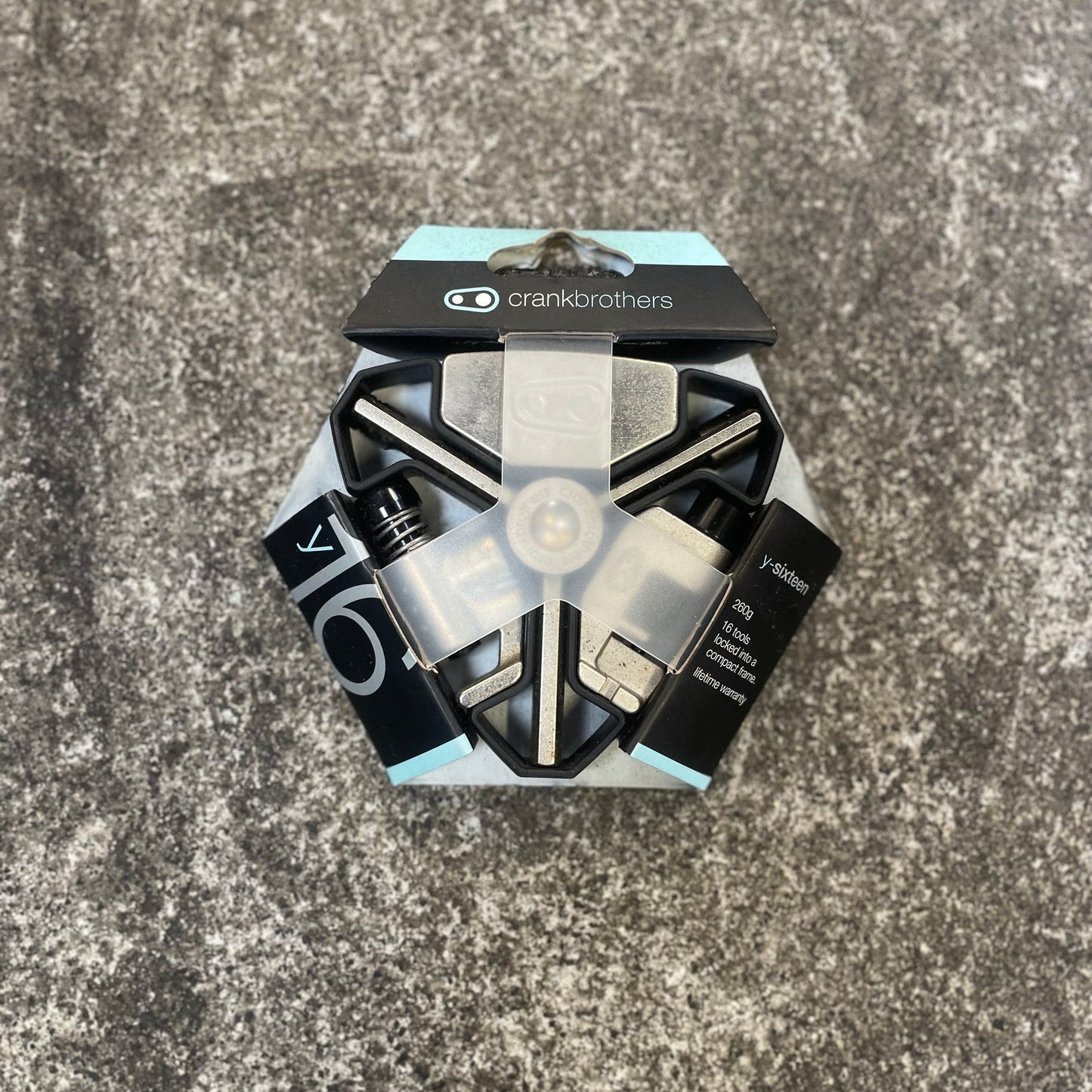 Crank Brothers packaging on a textured surface